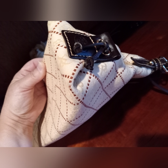 Dooney and Bourke East West Slouch canvas signature fabric. Cream and brown. - Picture 12 of 16